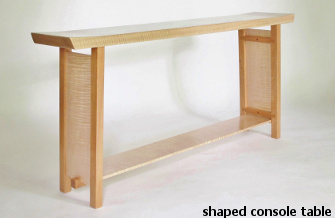 Our shaped console table is a long low narrow console table with abundant fine craftsmanship details. A work of art for your hallway table, entry table or sofa console. Would be beautiful at the end of the bed as well. Handmade solid wood furniture